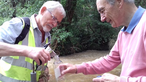 Oak Beck below the Hydro. Chris and John take a sample from a very muddy looking oak beck at a location well known for pollution events